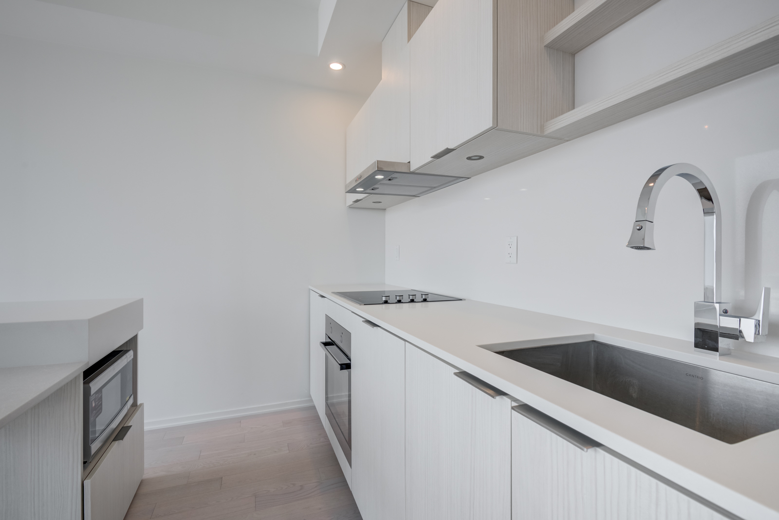 Close up of Unit 1703 kitchen and back-splash.