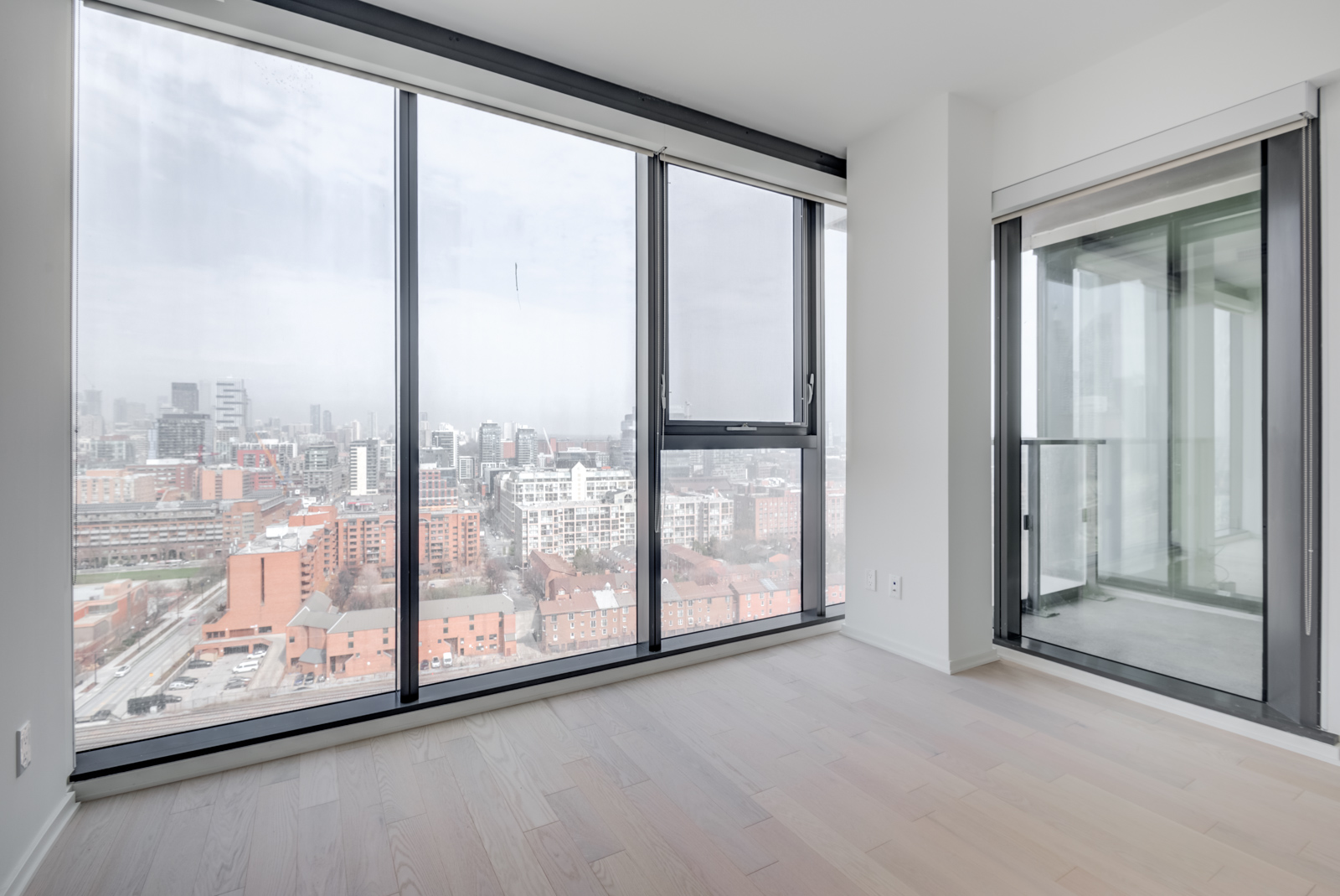 Photo of Unit 1703 master bedroom and windows with view.