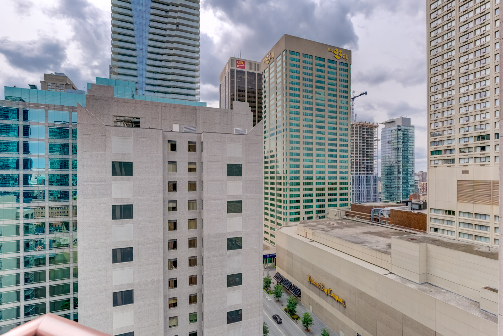 View of downtown Toronto, CIBC and Hudson's Bay buildings from 85 Bloor Unit 1814 balcony.