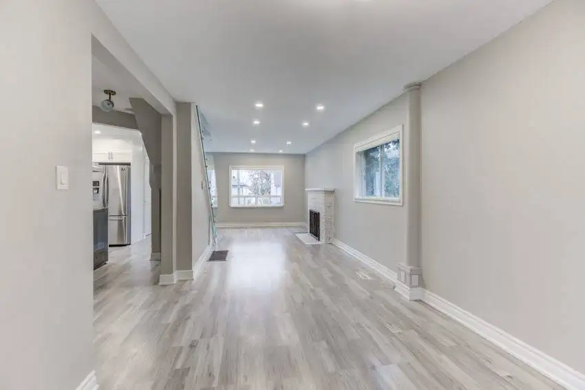 29 brightly lit house with pot lights windows and fireplace