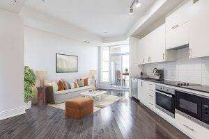 4 23 Glebe Rd W Unit 918 open concept living dining kitchen areas