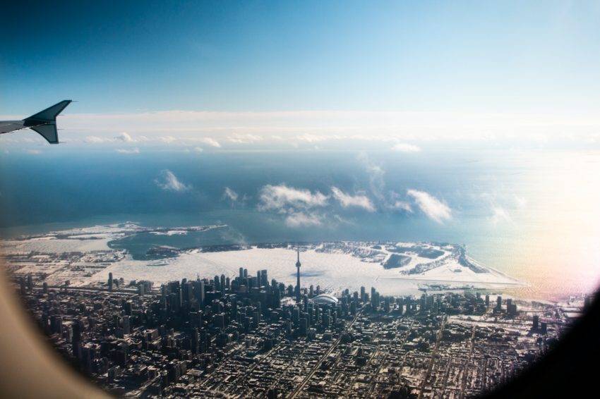 Toronto skyline seen from airplane window.