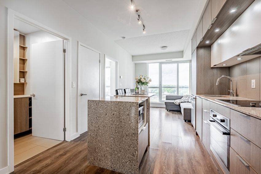 3. linear open concept kitchen and living room 55 Regent Park Blvd Unit 1210