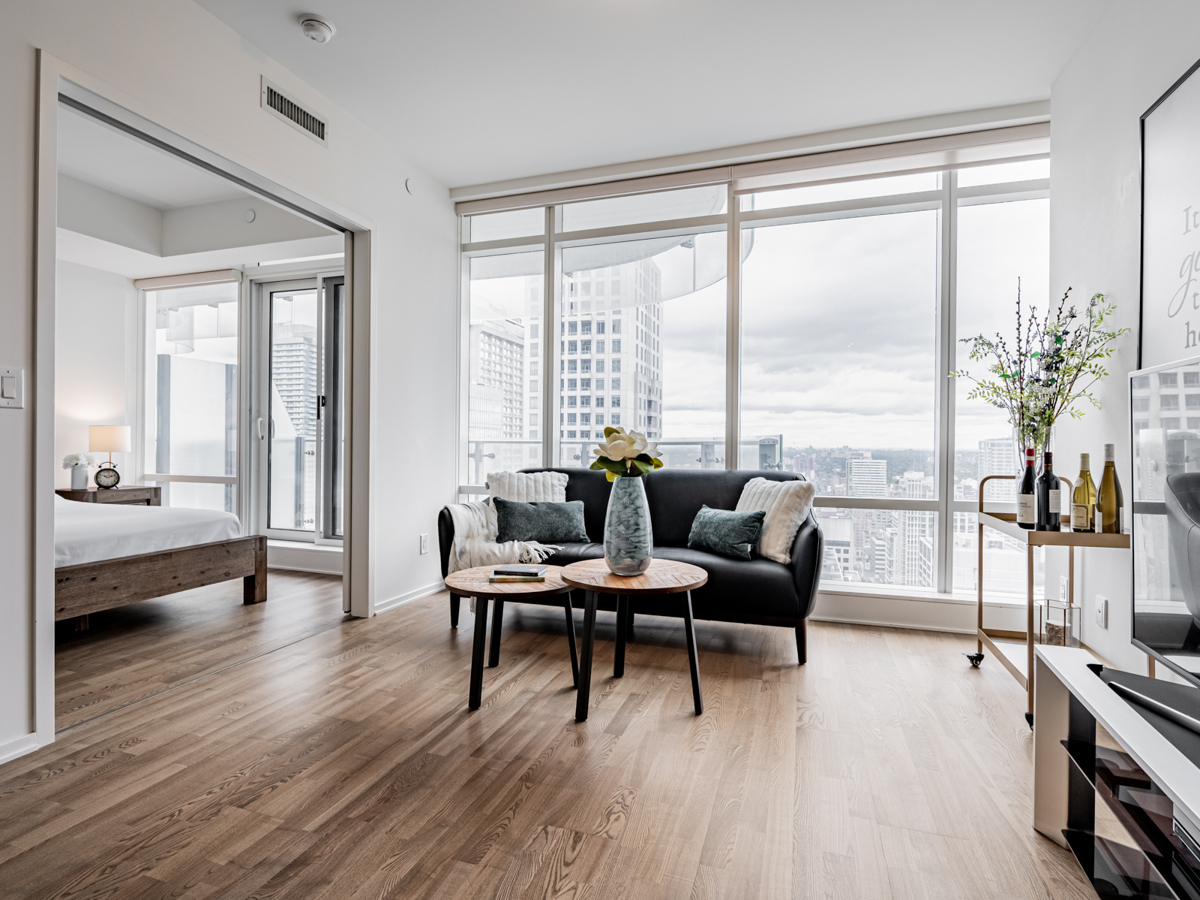 Condo with brown engineered hardwood floors.