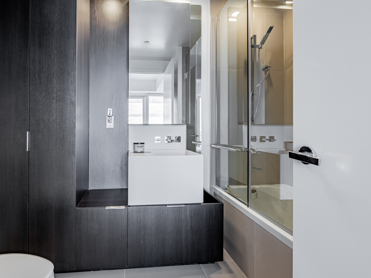 Bathroom with cabinets.