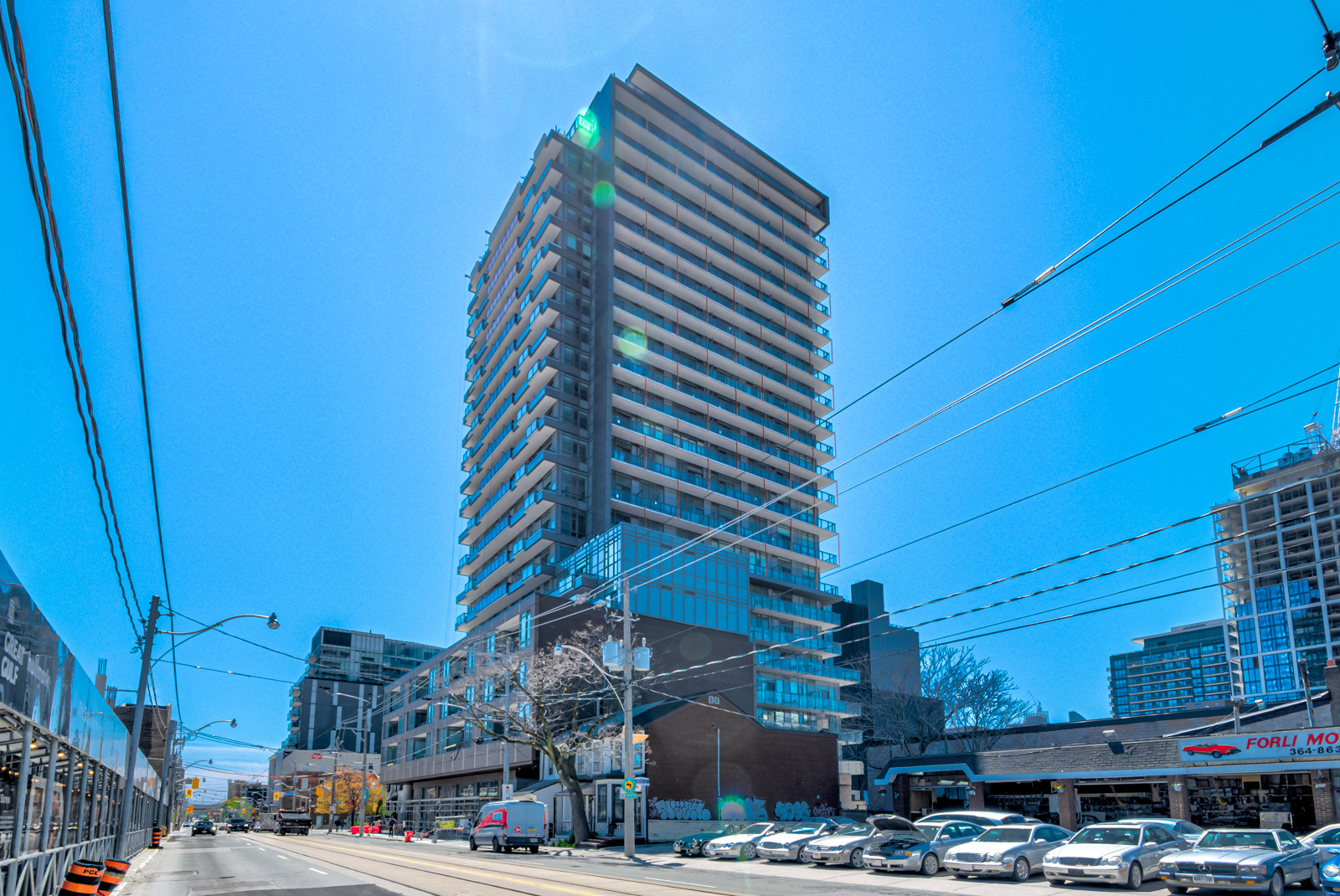 Across-the-street view of East United Condos, a mid-rise condo.
