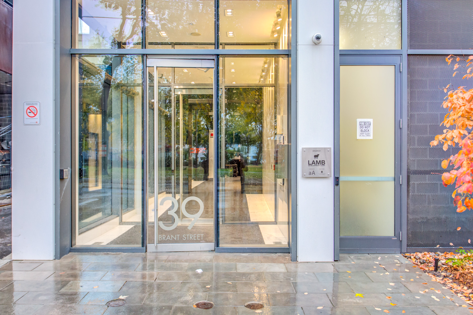 Glass door entrance to Brant Park Lofts on Adelaide St W and Brant St.