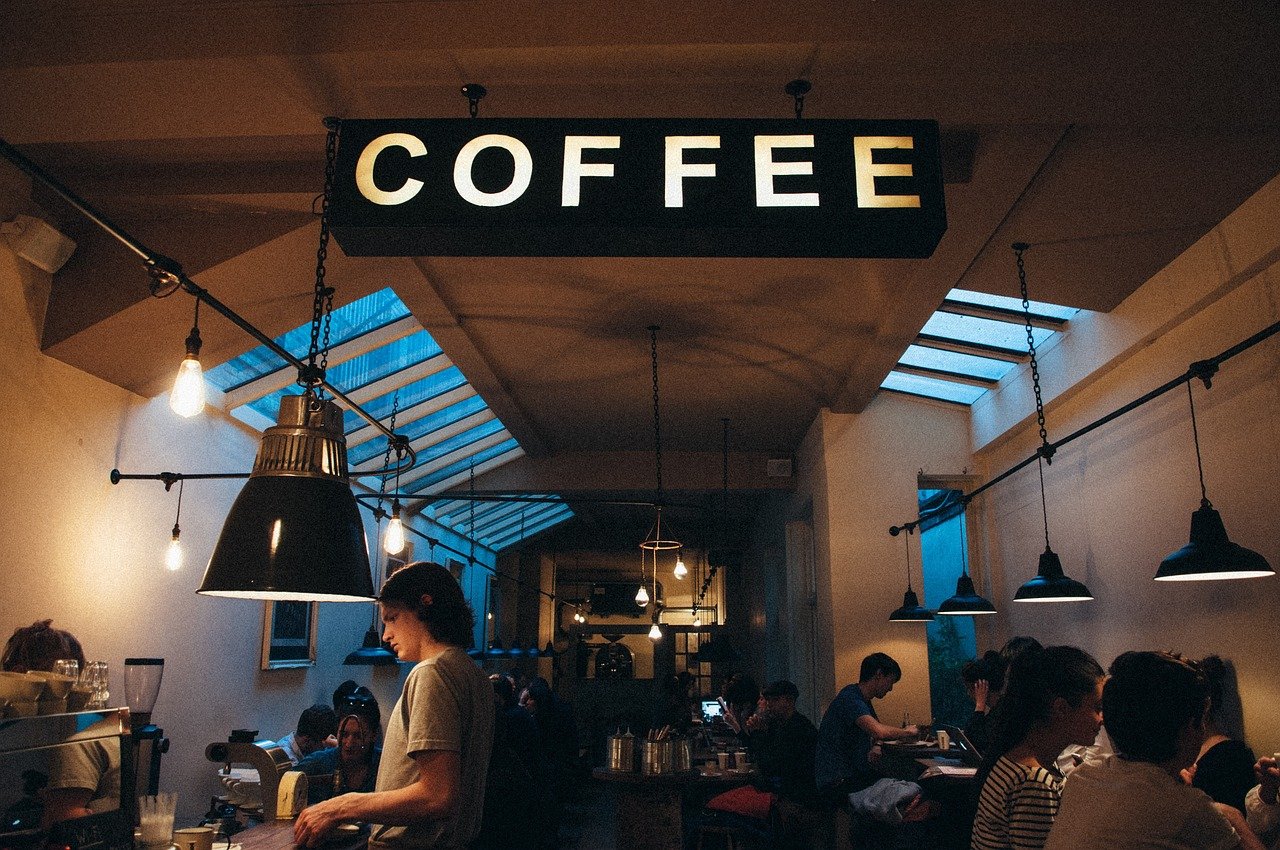 Dimly lit coffee shop in Dovercourt Wallace Emerson Junction.