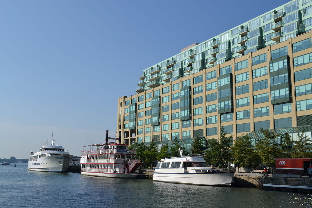 Photo of Queens Quay Terminal and boats and water.