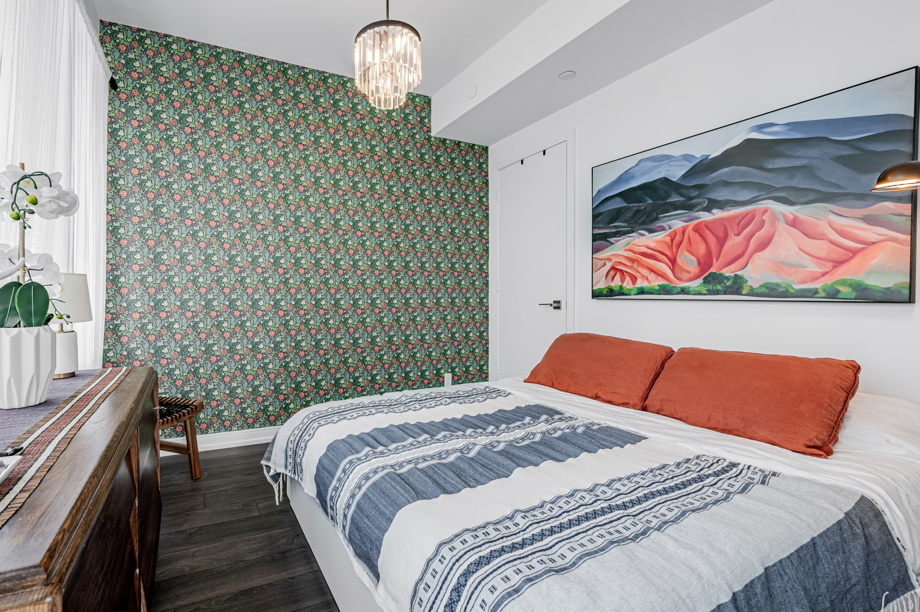 28 Wellesley St Suite 3009 – large master bedroom with chandelier and intricate wallpaper.