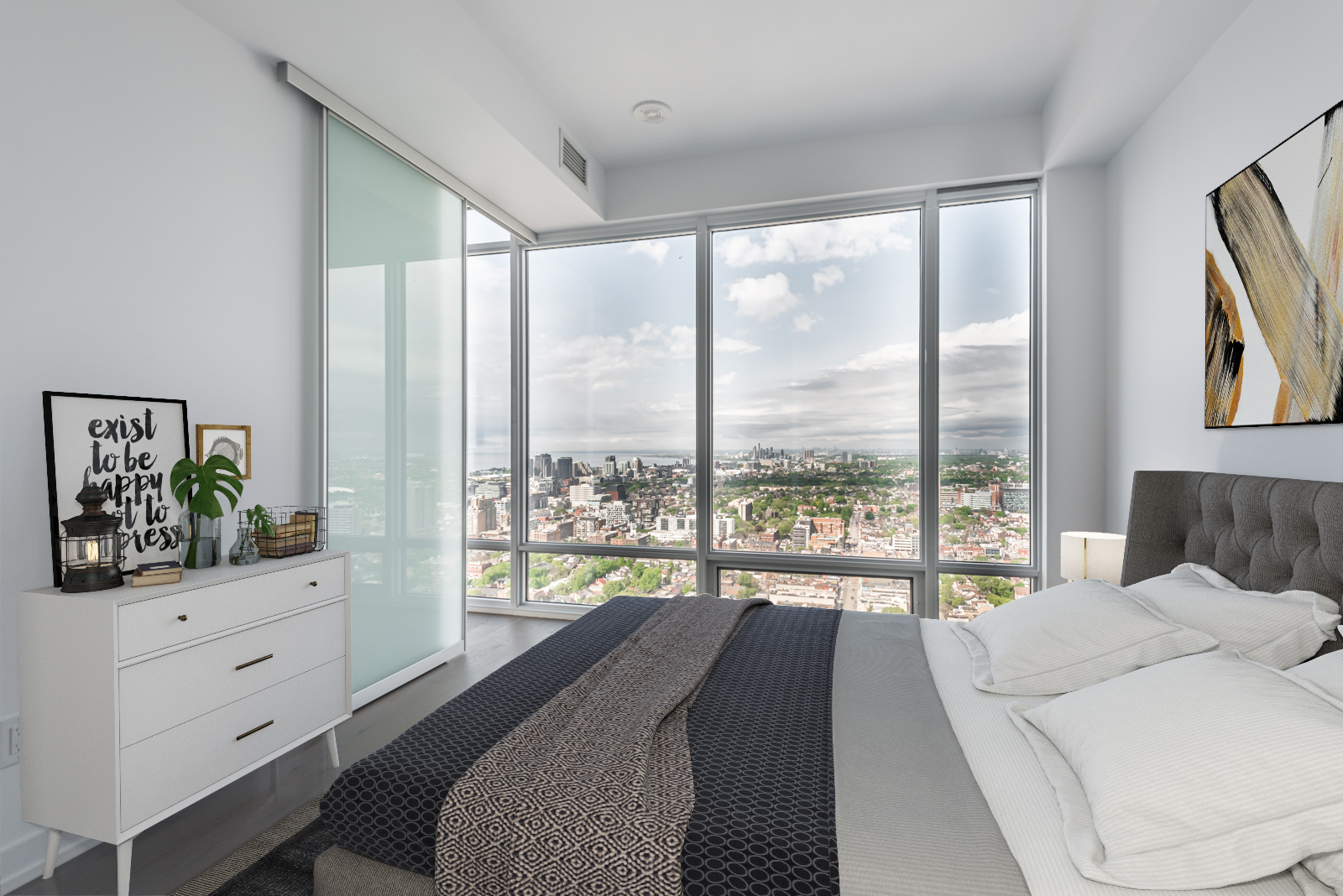 Huge window with Lake Ontario view from 488 University Ave Unit 3410 master bedroom.