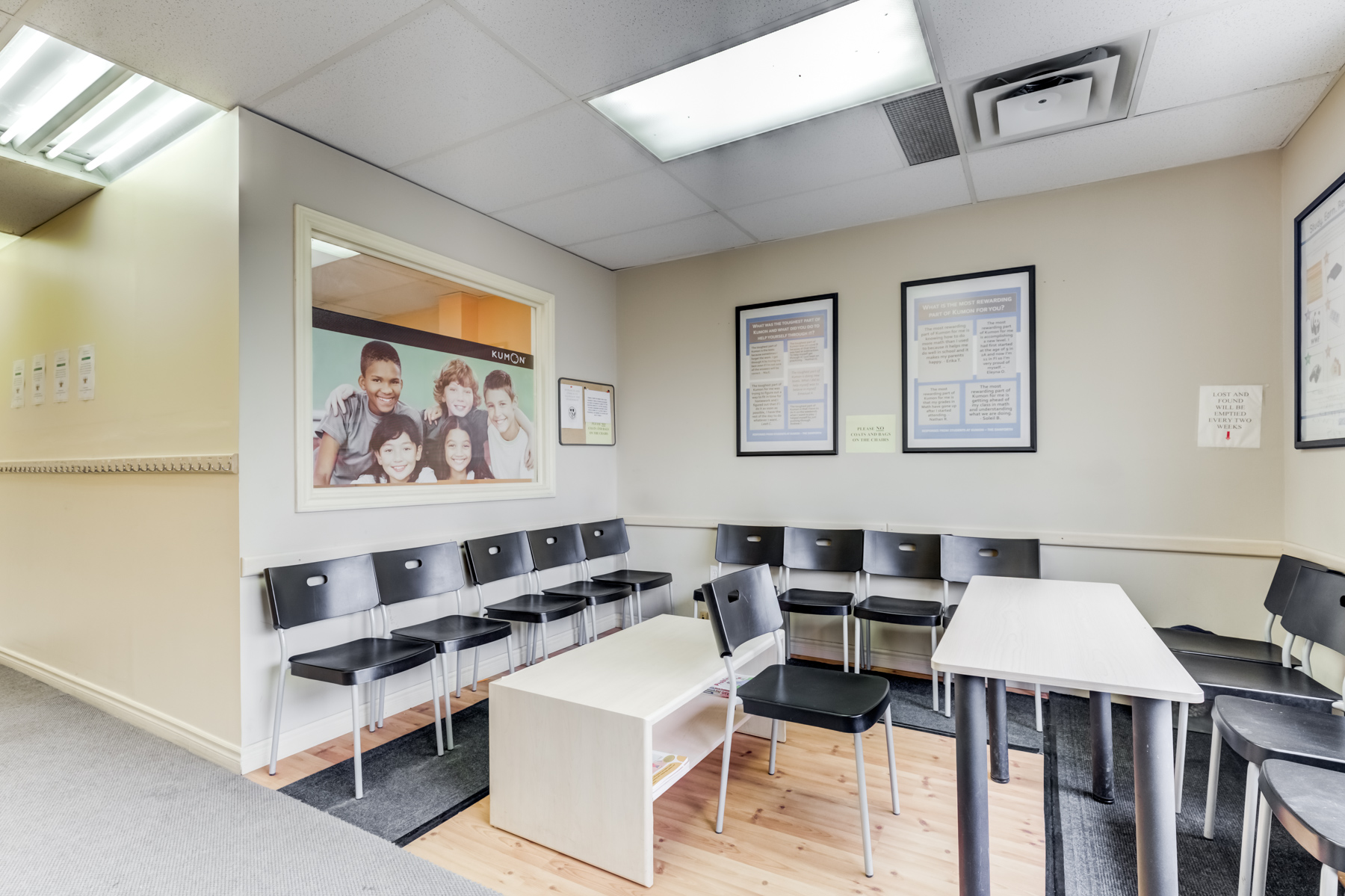 Kumon waiting area with chairs and tables.