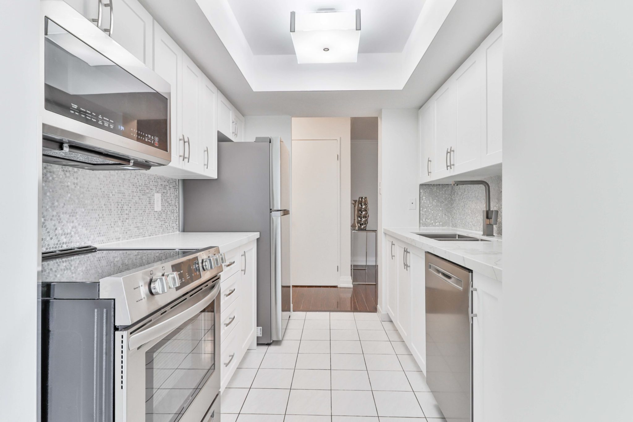 Newly renovated kitchen of 5 Rowntree Rd with updated appliances.