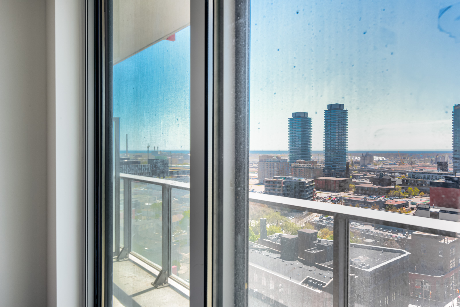 View of Toronto and Lake Ontario from 120 Parliament St Suite 1610 master bedroom.