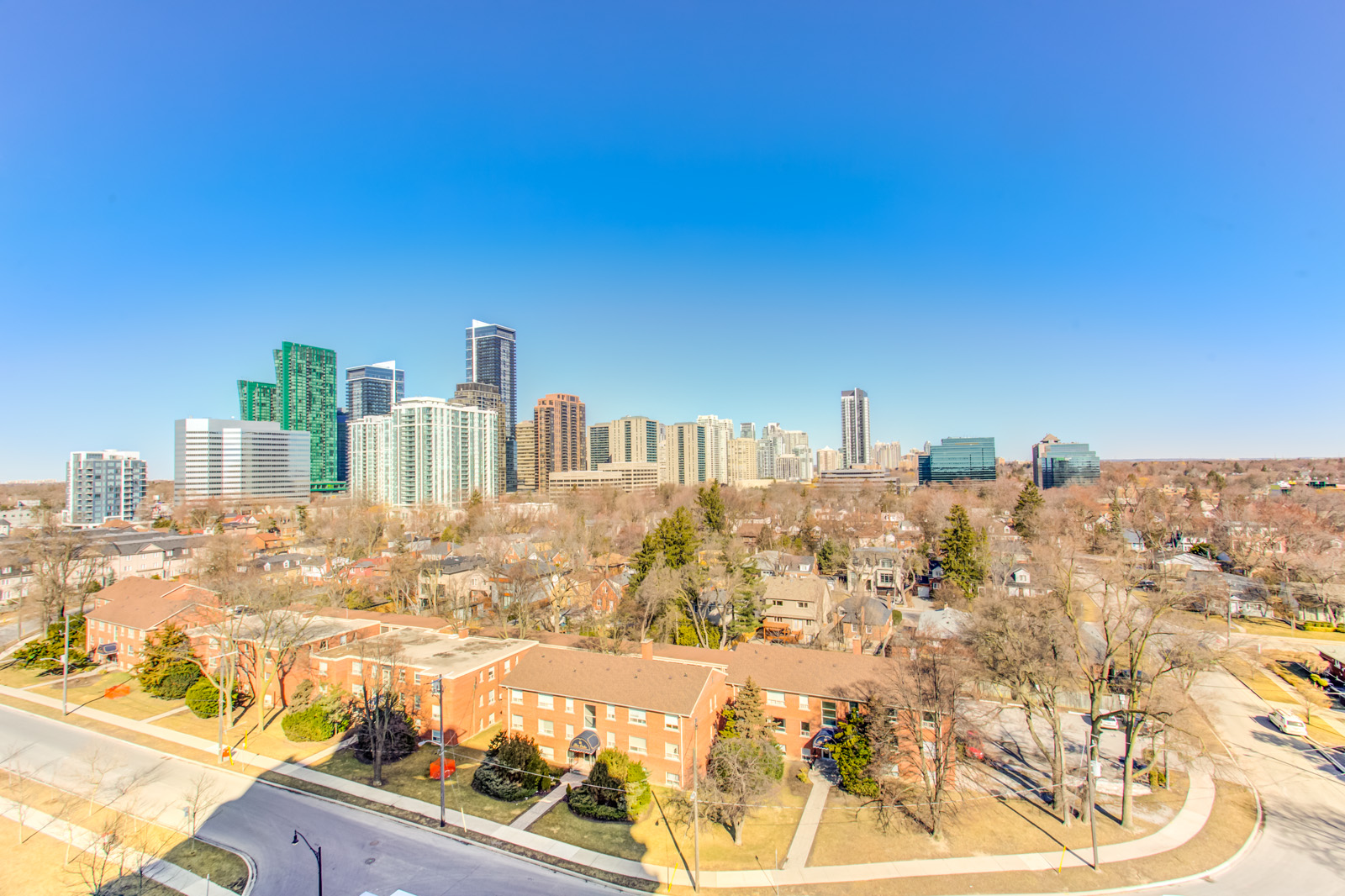 Sky view of Willowdale East in North York, Toronto and buildings far off.