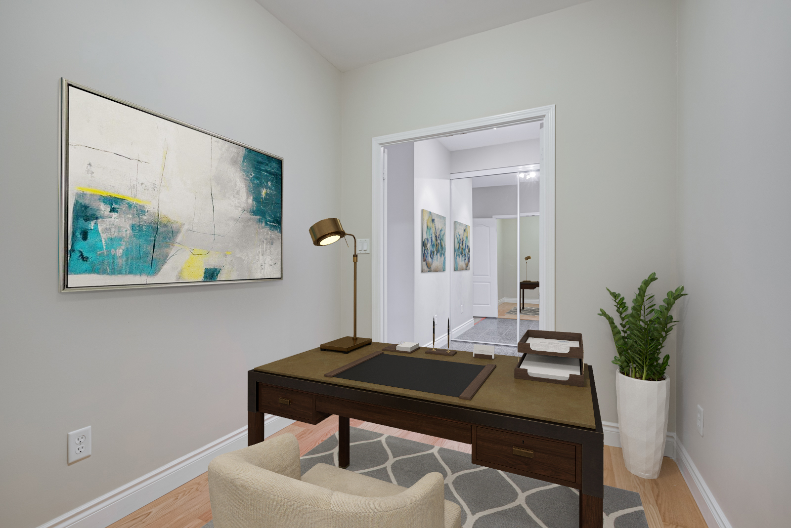 Condo den with 3d rendered desk, lamp and painting.