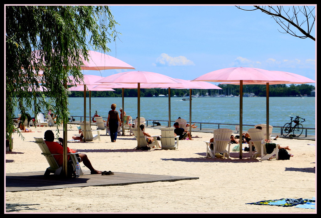 People relaxing at Sugar Beach on the Toronto Waterfront.