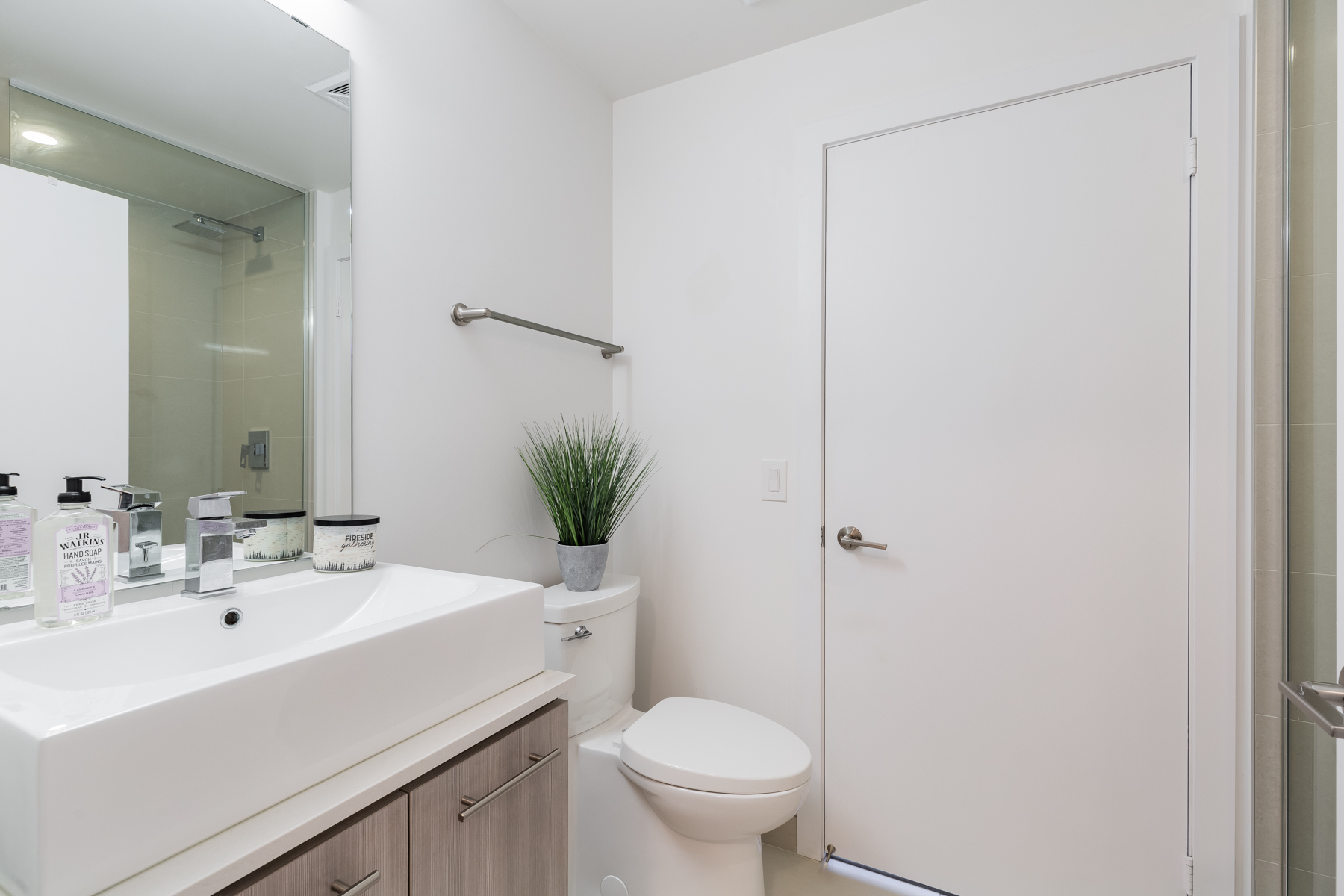 170 Chiltern Hill Rd Unit 410 bathroom with view of sink, toilet and door.