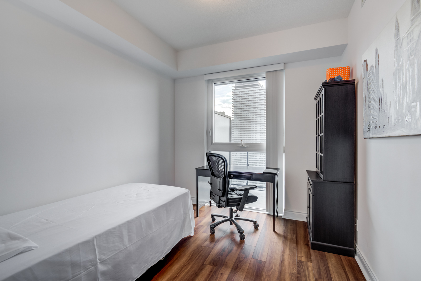 Second bedroom, bed and work desk of 28 Ted Rogers Way Unit 3609.