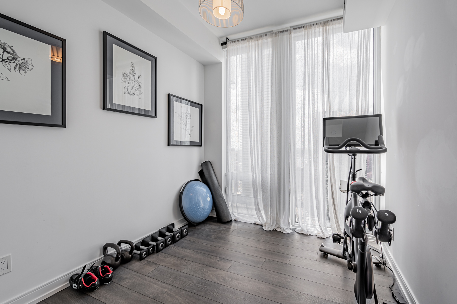 28 Wellesley St Unit 3009 – second bedroom being used as exercise room.