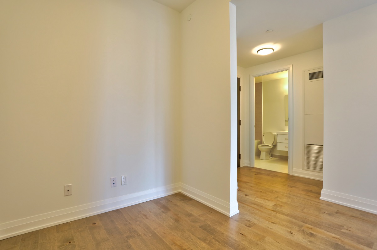 View of condo den and bathroom.