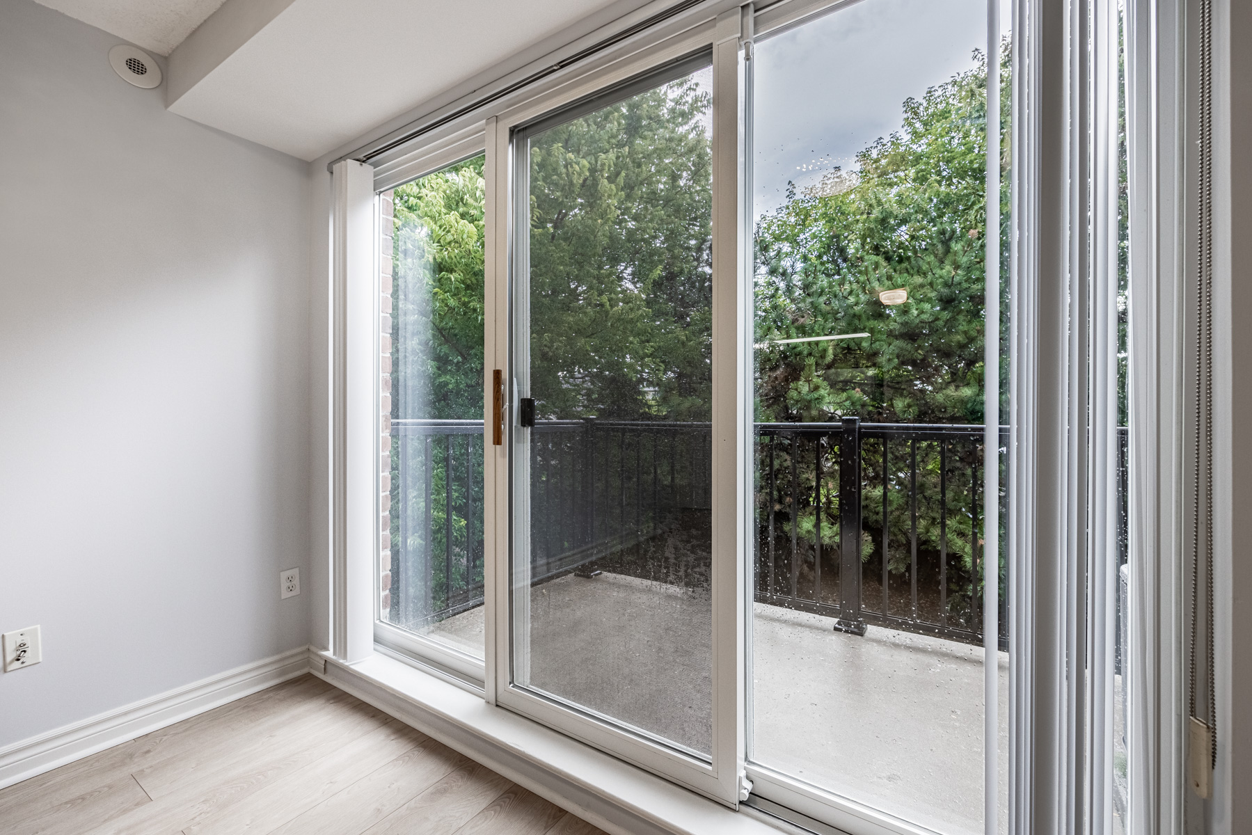 Living room with balcony doors – 95 George Appleton Way Unit 2162.