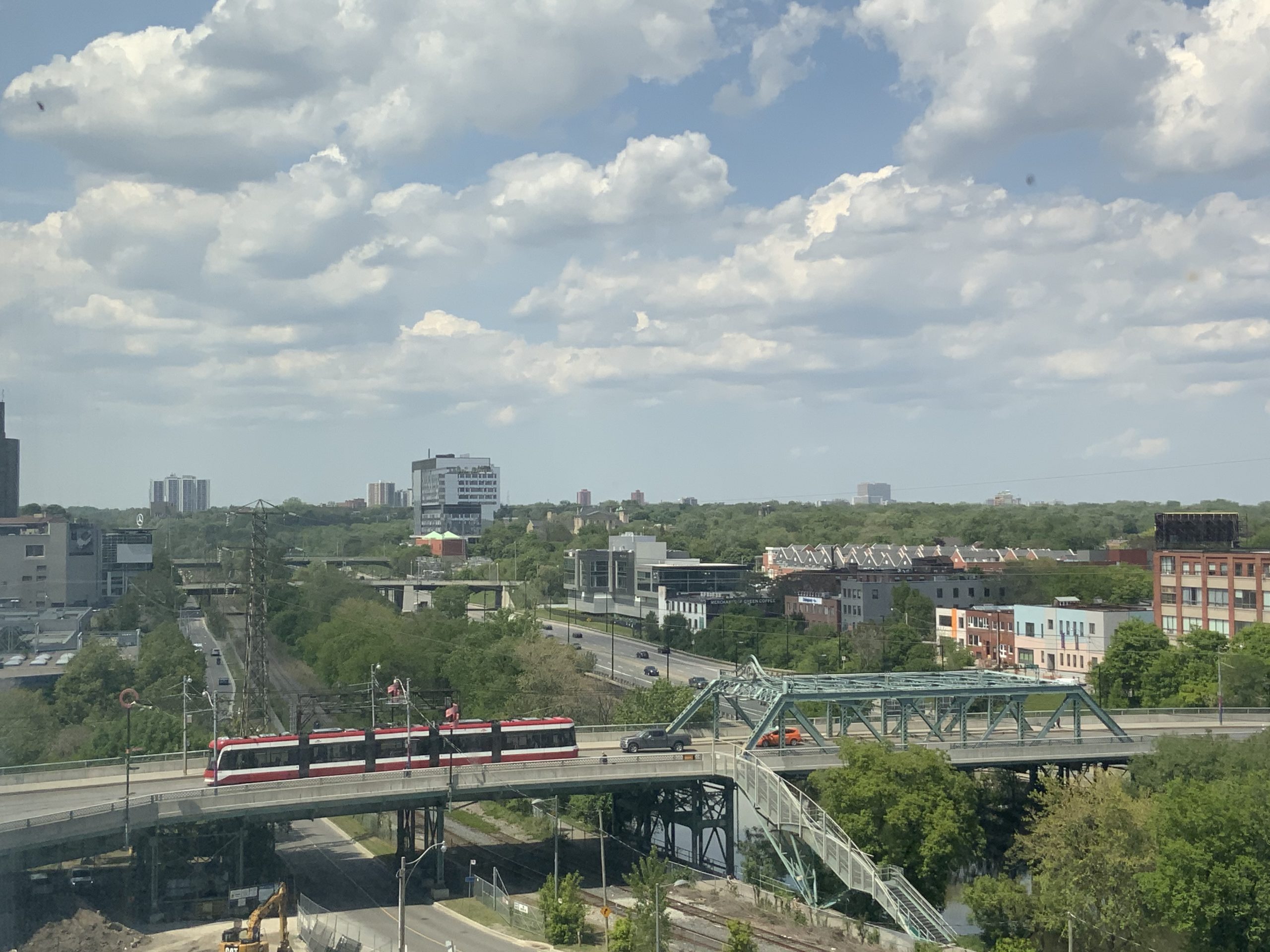 View of Corktown Toronto buildings, trees and TTC streetcar.