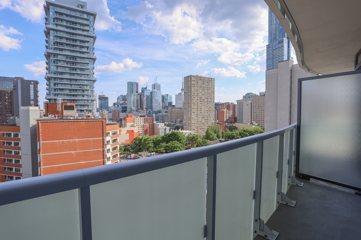 Afternoon view of Toronto skyline from balcony of 403 Church St Unit 1101.