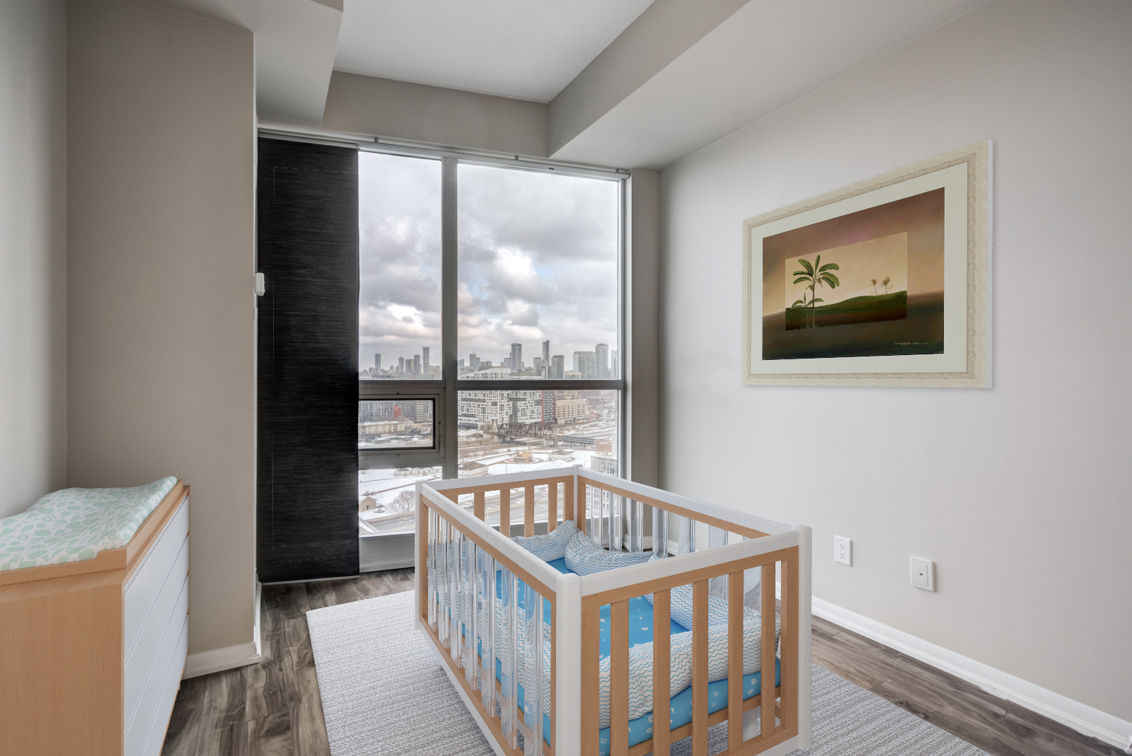 Nursery with 3D crib and painting at 215 Fort York Blvd #2310.