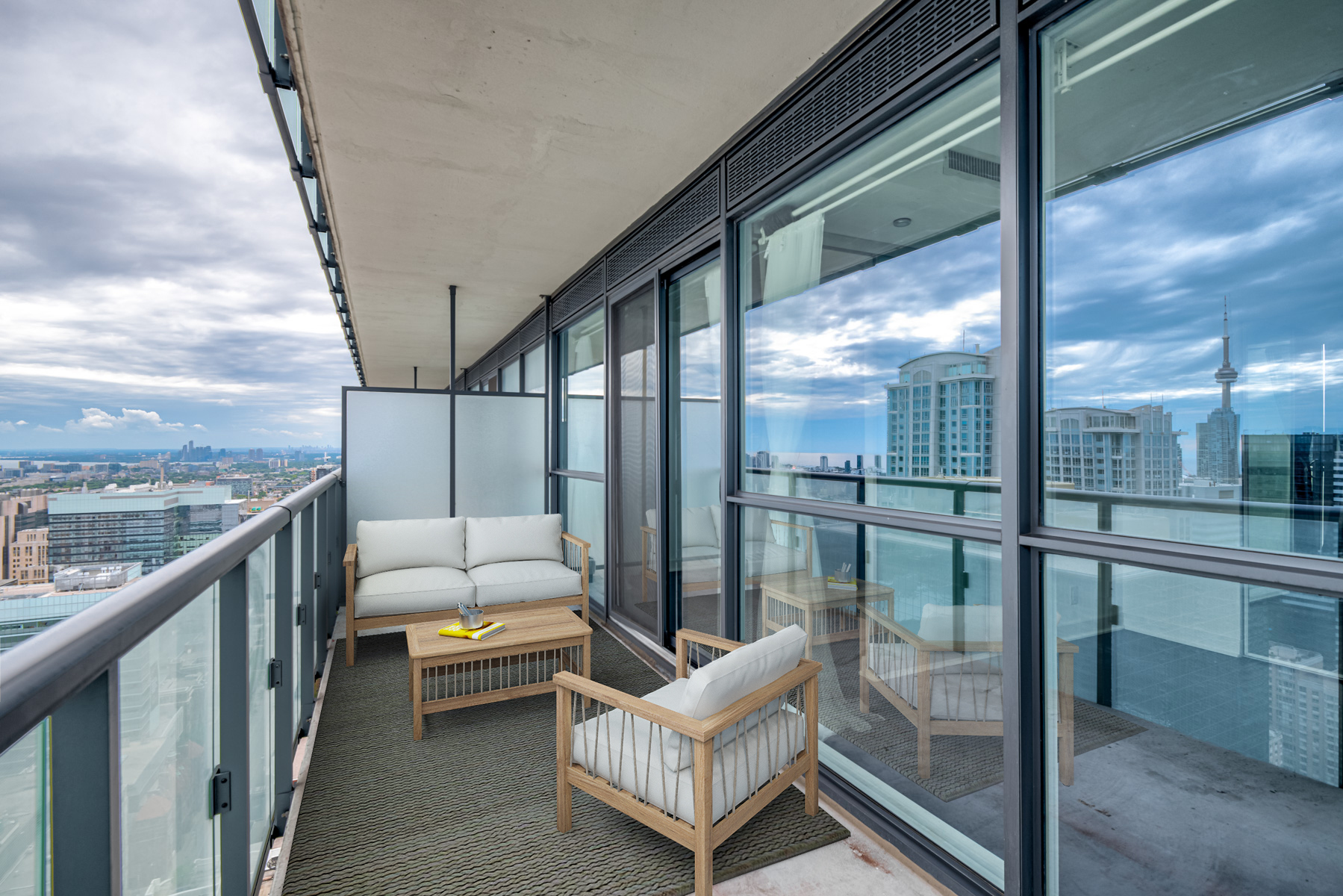 15 Grenville St balcony with 3D chairs and furniture.