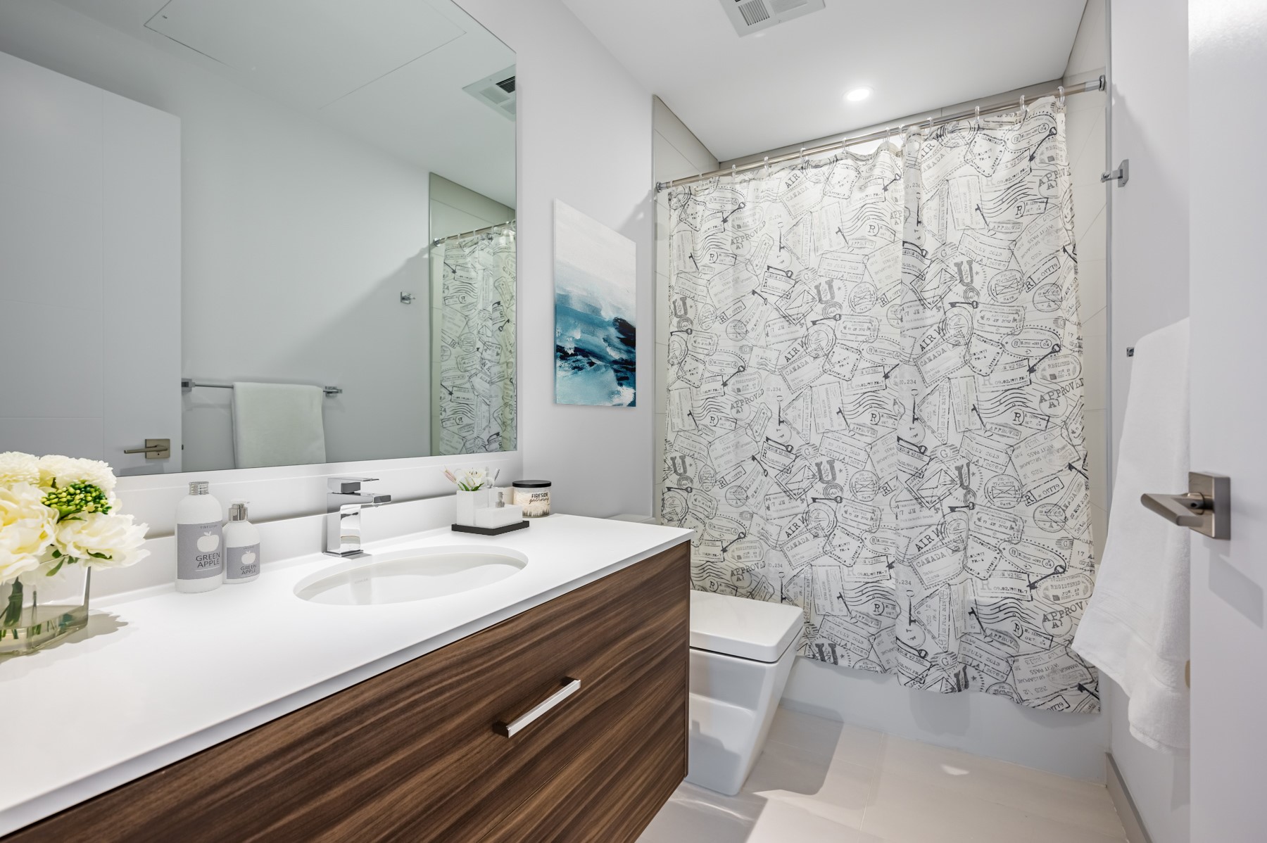 4-piece washroom quartz counter and gray and white colours.