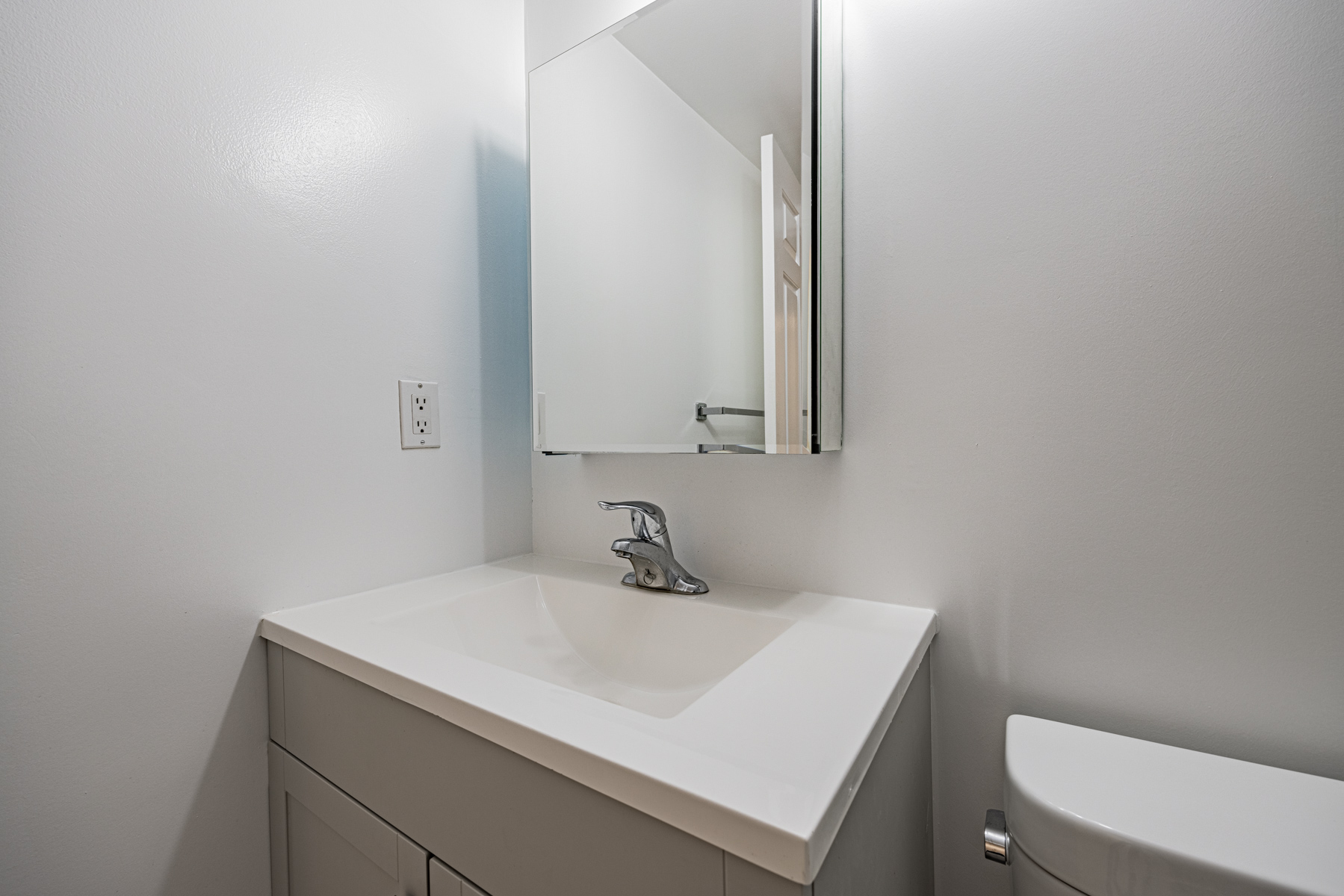 Medicine cabinet with mirror.