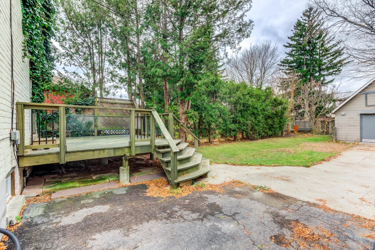 Large wooden deck and backyard of 54 Huntington Ave.