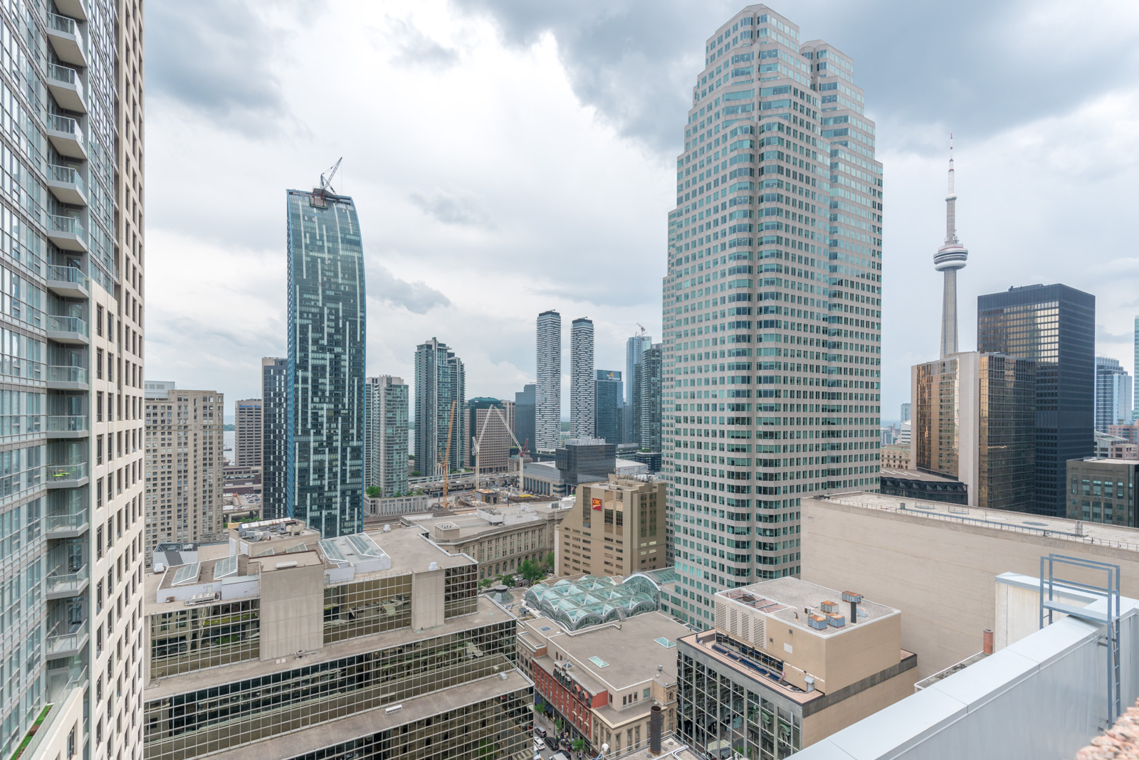 Toronto's Financial District skyline, including CN Tower and CIBC building, from 7 King St E roof.