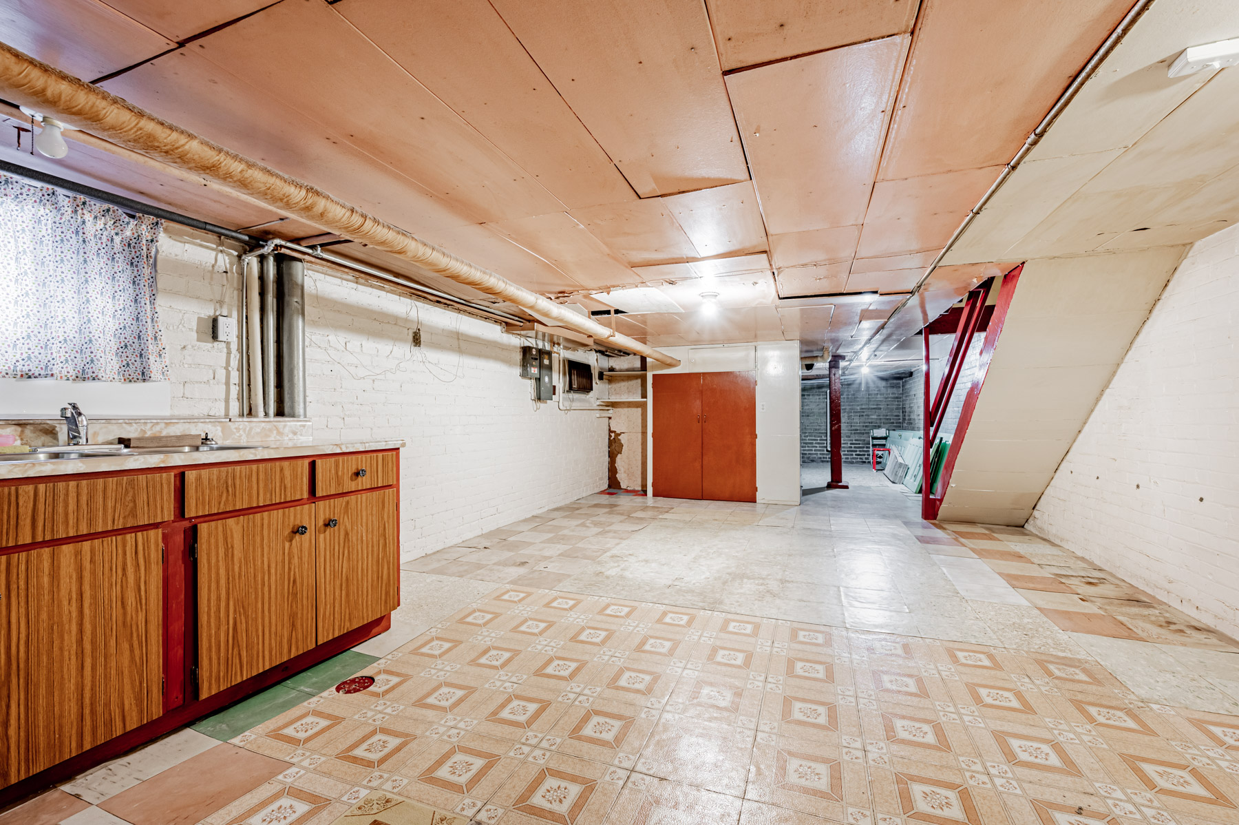 27 Granby St large unfinished basement with unpainted walls.