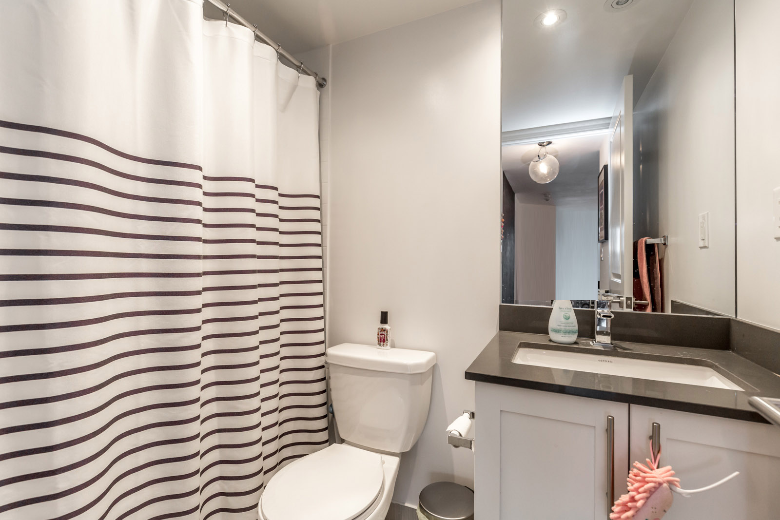 Photo showing a bathroom with crisp lines and clean layout