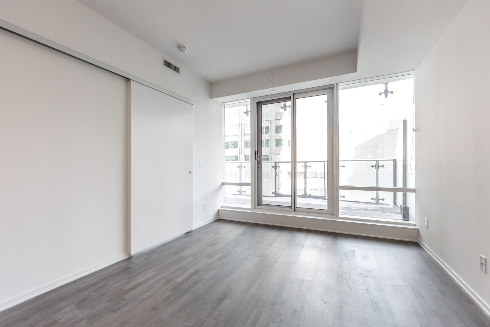 Image of master bedroom and wide windows