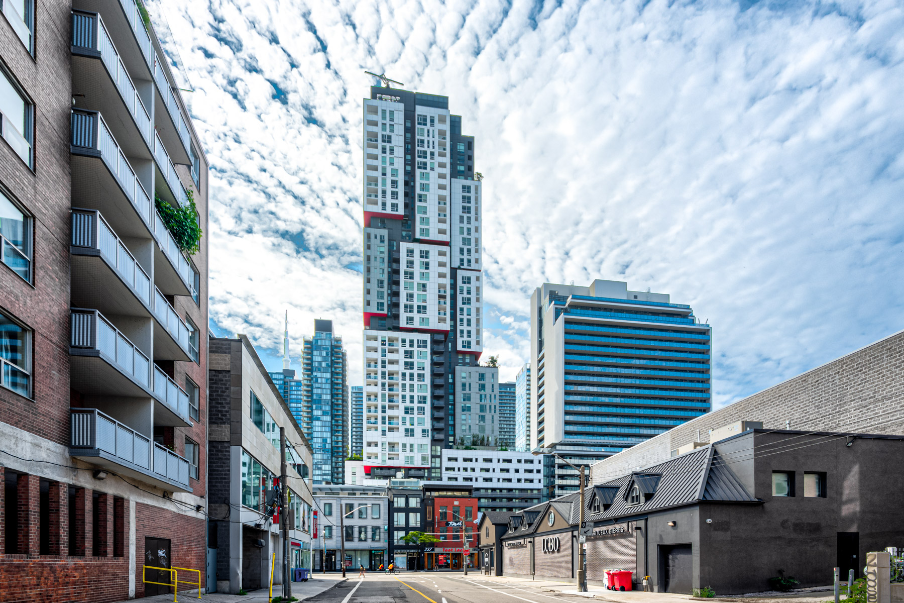 Looking up at Picasso on Richmond, a red and white condo inspired by Cubism.