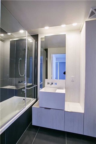 Shot of 1 Bloor Unit 3109 master bathroom. Everything is very geometric due to the sharp lines.