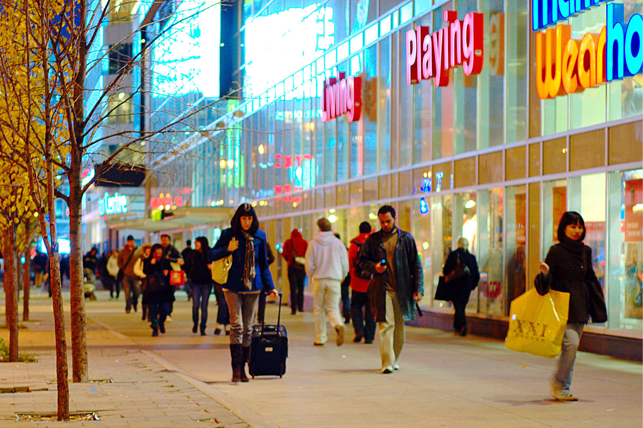 Image of street and shops at night