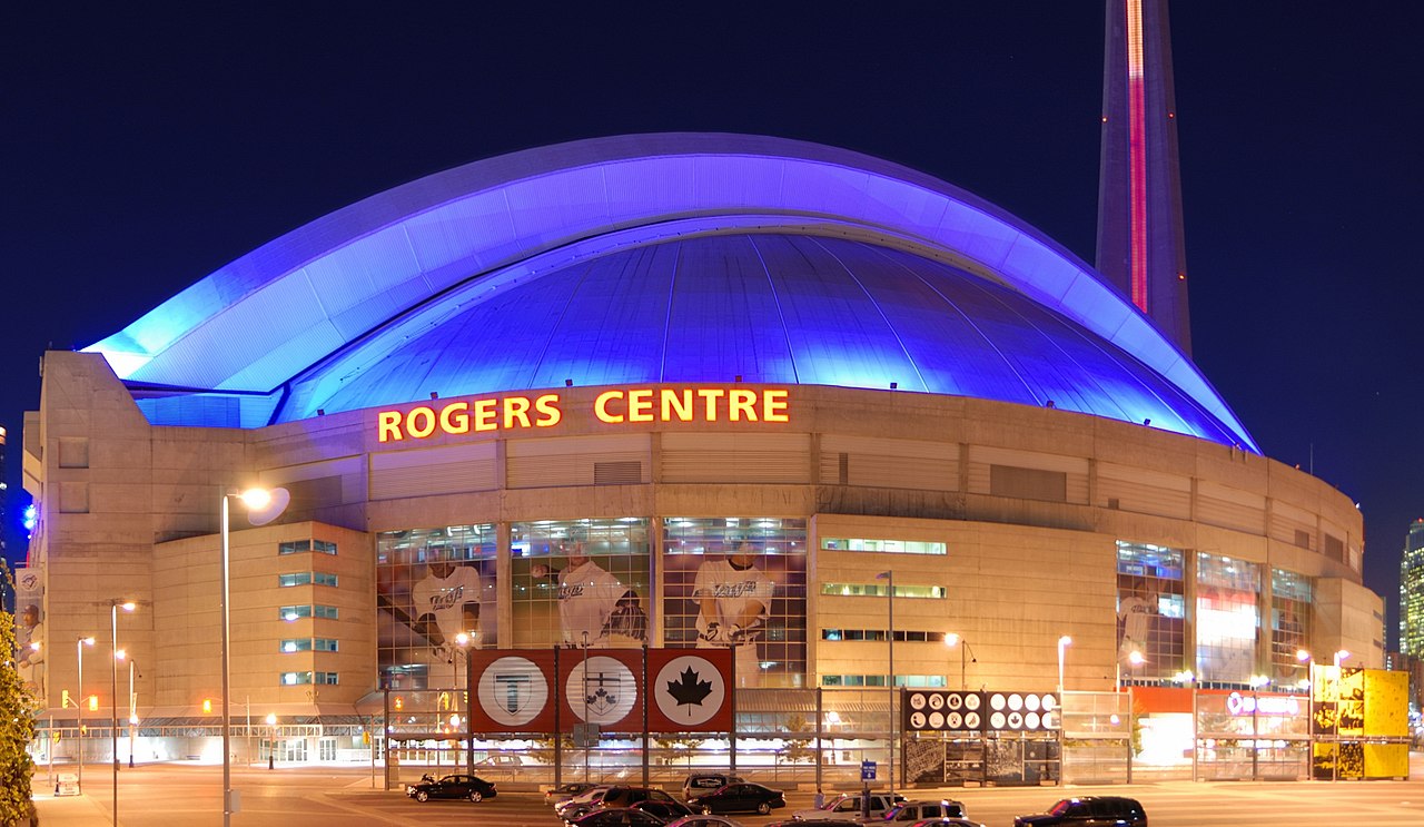 Night shot of the Rogers Centre (so, and, first of all, also, another, furthermore, finally, in addition because, so, due to. While, since, therefore same, less, rather. So while, yet, opposite, much as. Either as a result, hence, consequently, therefore, in conclusion).