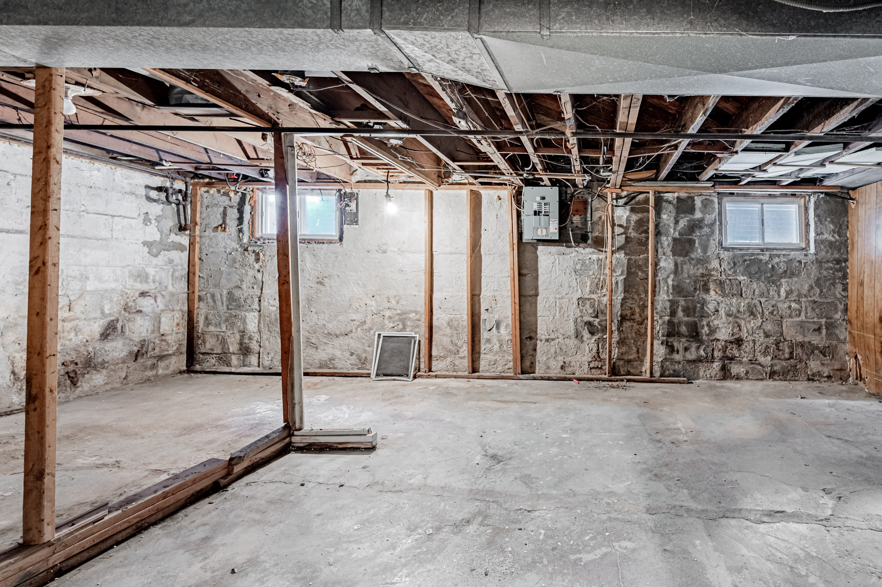 35 Woburn Ave unfinished basement with windows.