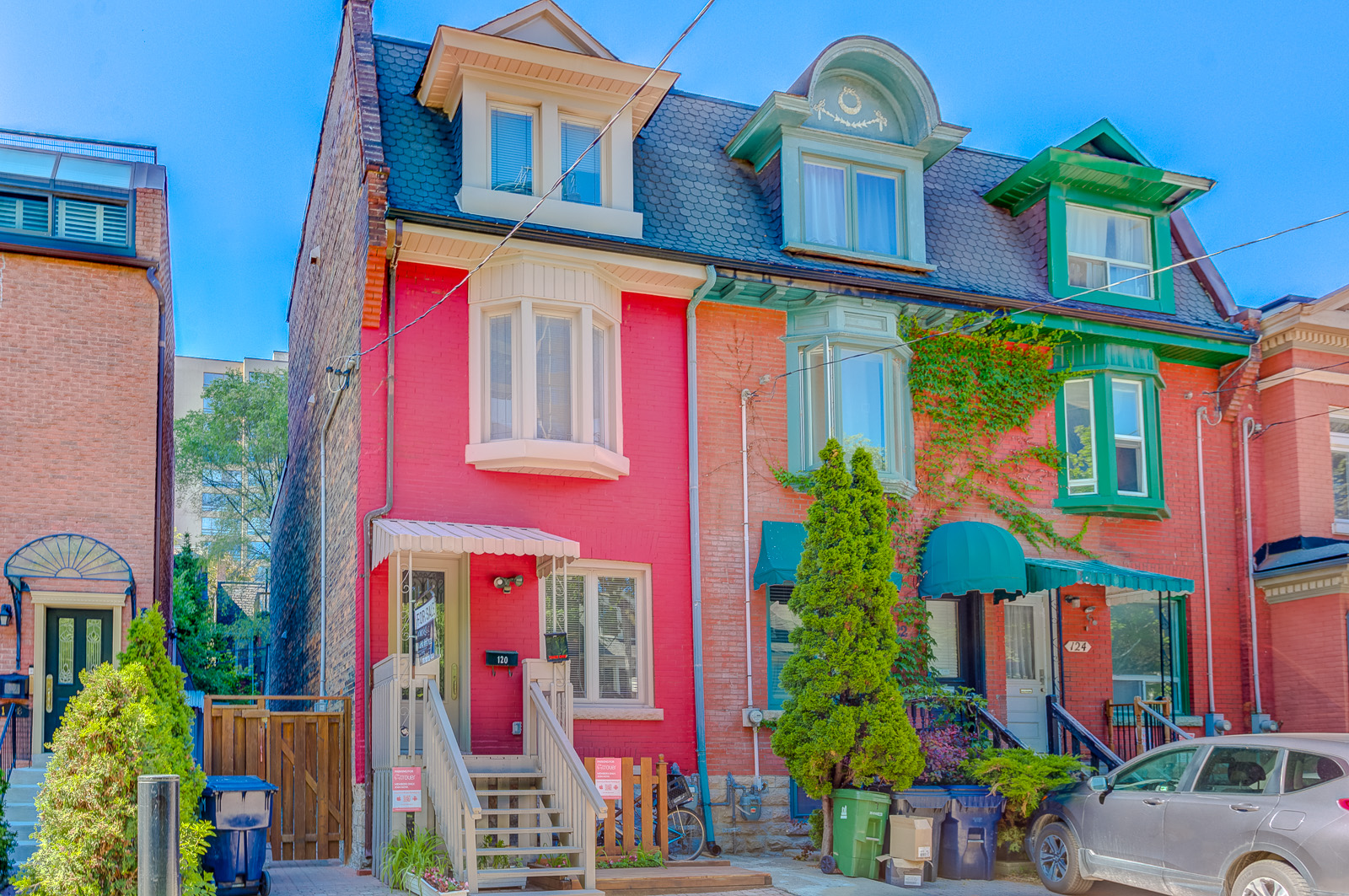 Colourful houses in Church-Yonge Corridor, which is experiencing low price appreciation.