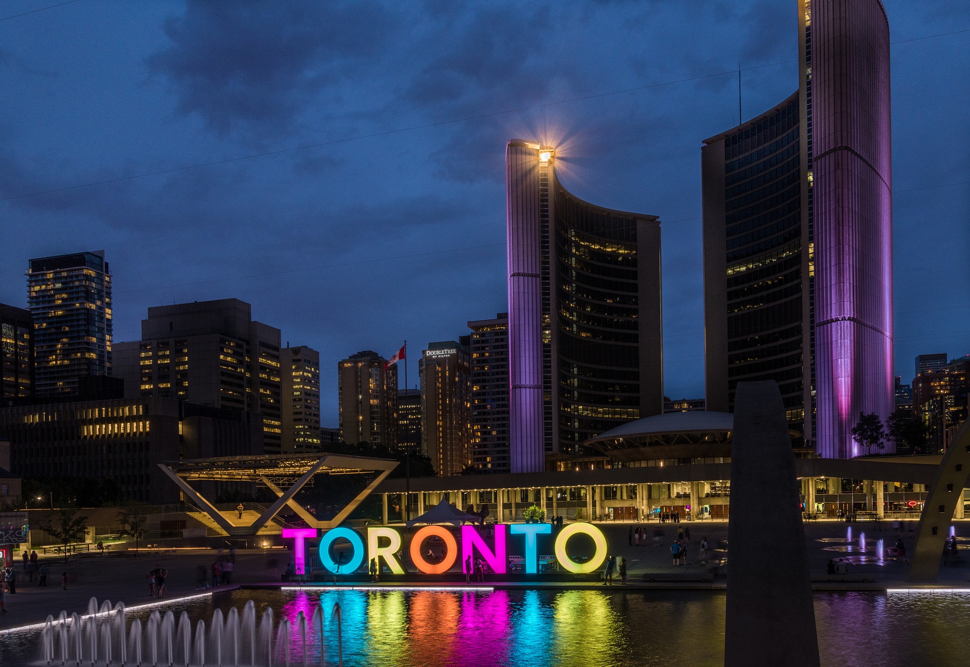 Photo of Toronto City Hall at night same, less, rather, while, yet, opposite, much as, either as a result 