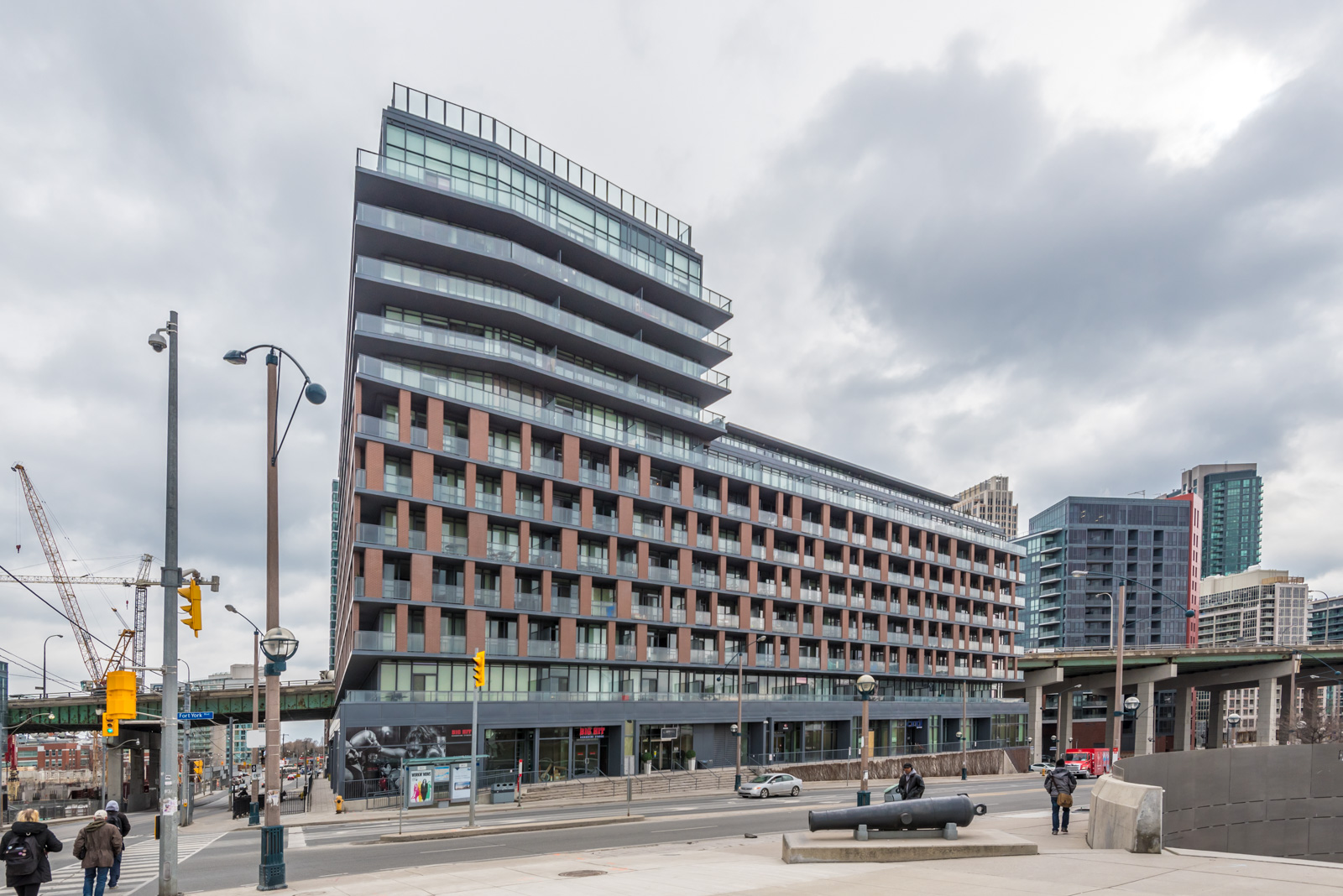 This photo shows 169 Fort York from outside. We see the use of so much glass and steel. It's red-brick almost leaps out.