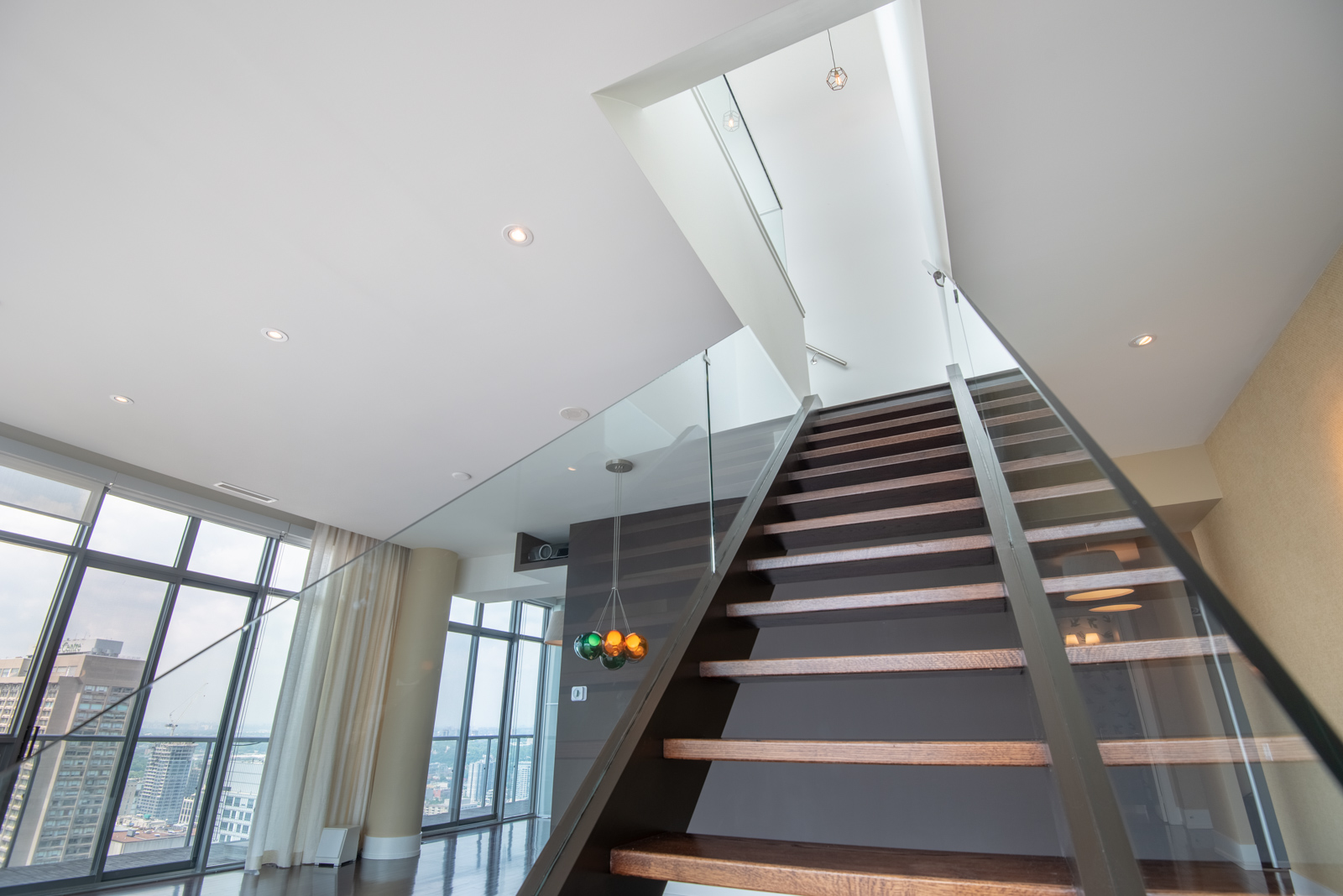 View of stairs and glass rails.