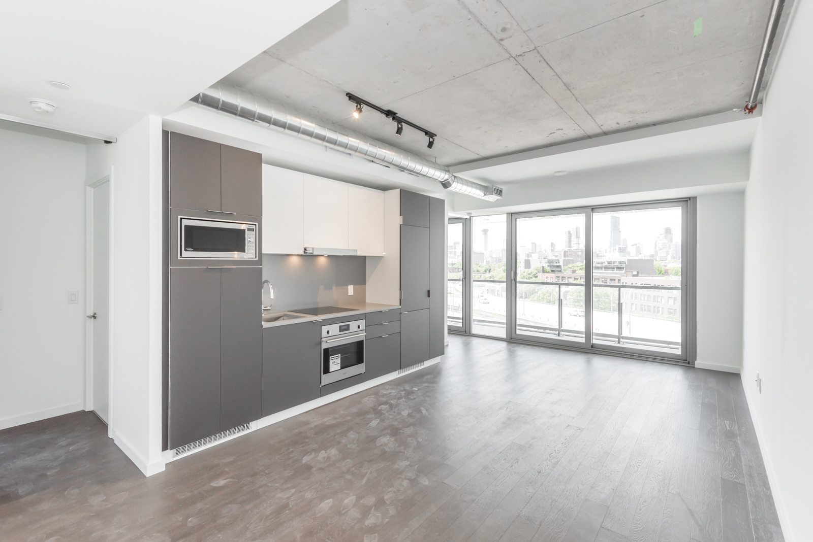 Kitchen and living room view showing almost 800 square feet of space.