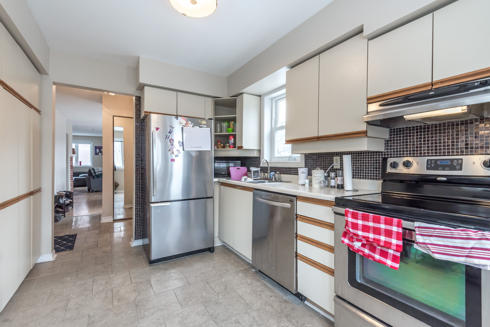 Multiple cabinets and drawers provide plenty of space for plates, utensils and smaller appliances.