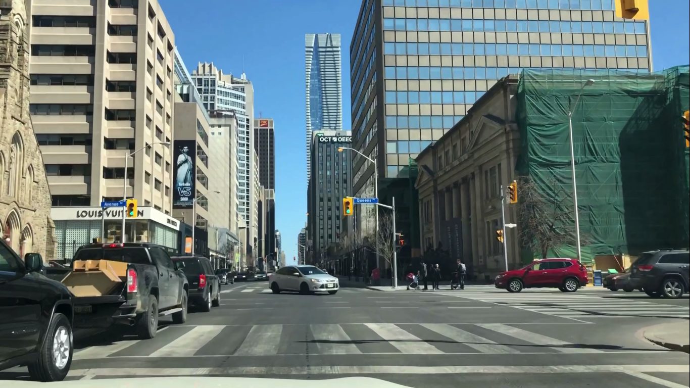 The intersection of Queen St. and Avenue Rd. 1 Bloor can be seen in the distance.