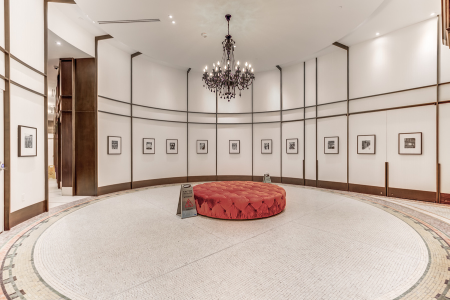 Massey Tower's circular lobby made of plaster, stone and wood.